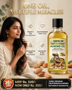 Seraphic Sun Wood-Cold Pressed Almond Oil bottle alongside a woman and raw almonds, highlighting product benefits including Vitamin E, zero cholesterol, and chemical-free slow pressing.